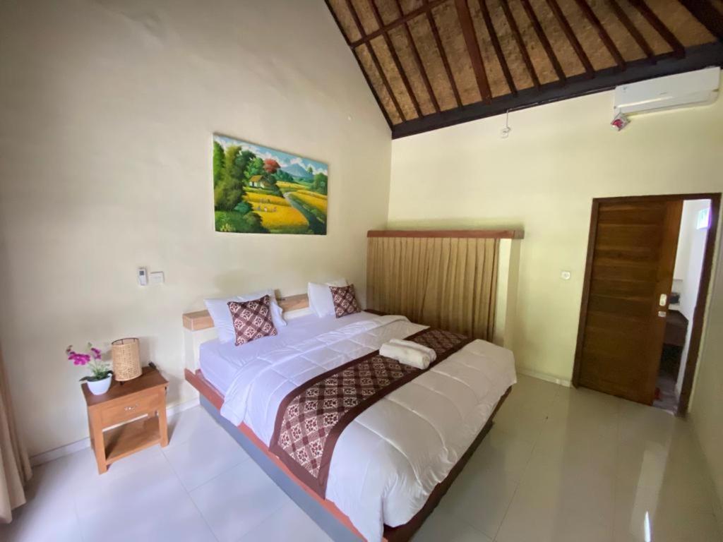 Pomelo Guest House Ουμπούντ Δωμάτιο φωτογραφία